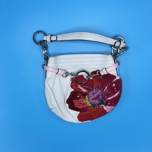 Coach shoulder bag with beautiful flower appliqué